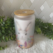 Load and play video in Gallery viewer, Easter Rabbit Glass Coffee Cup, Bunny Floral Iced Coffee Cup with Bamboo Lid and Straw, Easter Gift, Coffee Aesthetic 16oz
