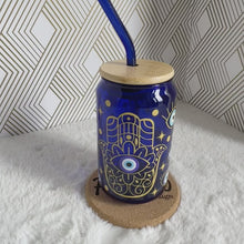 Load and play video in Gallery viewer, Evileye Glass Coffee Cup, Blue Glass Coffee Cup with Bamboo Lid and Straw, Iced Coffee Frosted Glass, Gift for Friend, Aesthetic UV DTF 12oz
